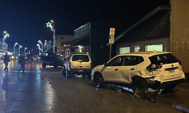 No serious injuries after truck strikes trash can, cars, building downtown