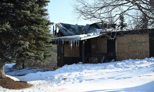 Gunman found dead in burned home after shootout with Anchorage officer, police say