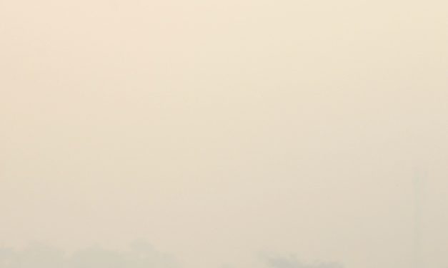 Indonesians brave choking smoke to pray for rain as country battles wildfires