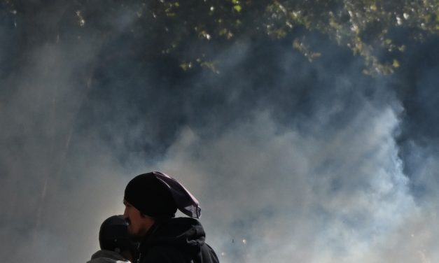 Scuffles and fires break out as protesters rally across France, joining students
